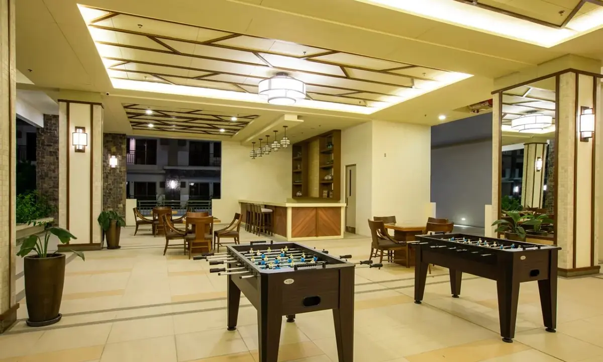 Maple Place indoor game room with foosball tables, DMCI Homes condo amenity in Acacia Estates, Taguig City, actual photo