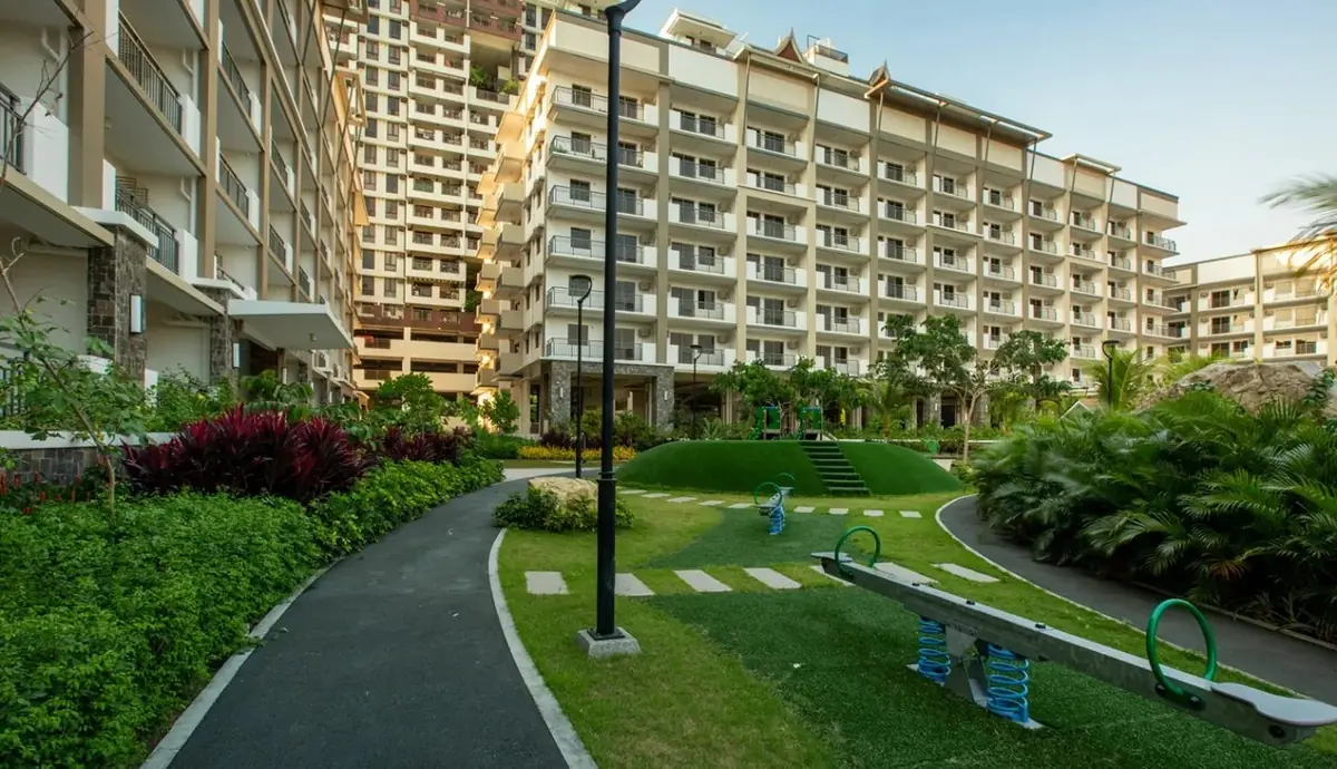 Maple Place children's play area with slide and playground equipment, DMCI Homes condo amenity in Acacia Estates, Taguig City, actual photo