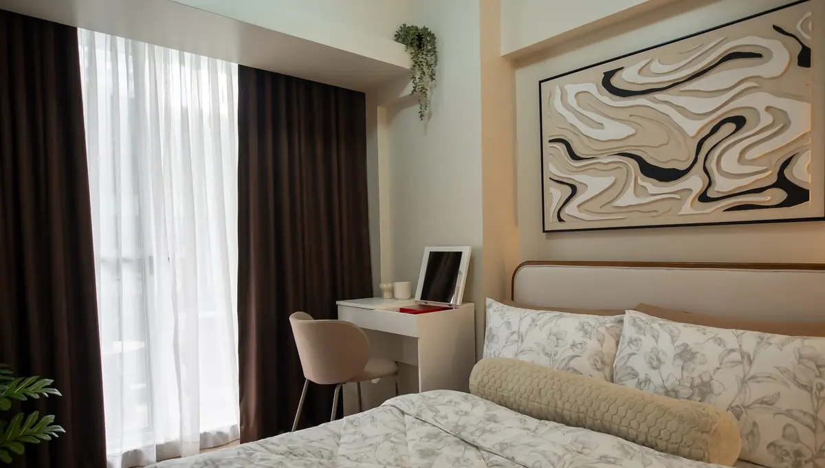 Studio bed and dressing area representative interior from a similar DMCI Homes project